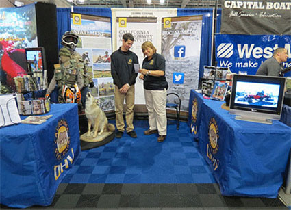 Photo of the OHMVR Division Booth and Staff at the Sportsmens Expo