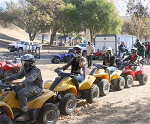 photo of youth on ATVs